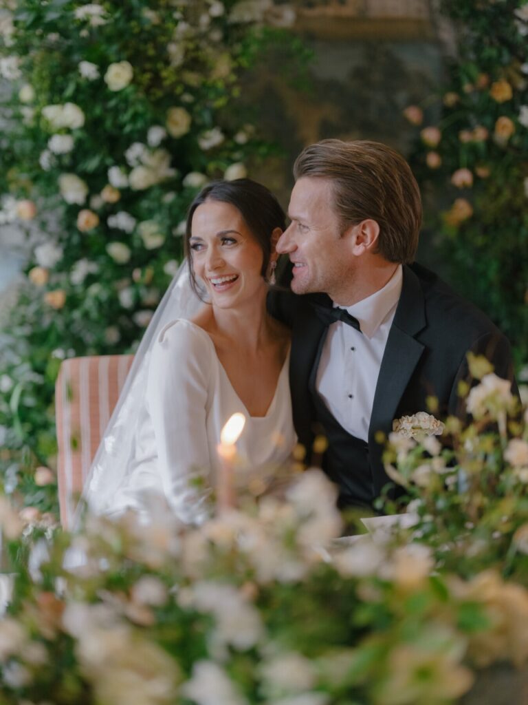 Bride and groom at a wedding table